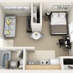 Compact studio apartment floor plan with separate sleeping area, workspace, and efficient storage solutions.