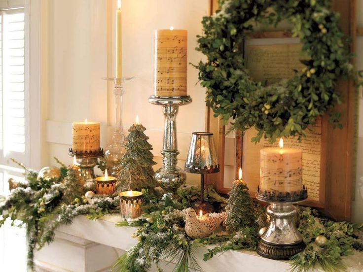 Elegant January mantel decorations with candles, greenery, and neutral winter home decor accents.