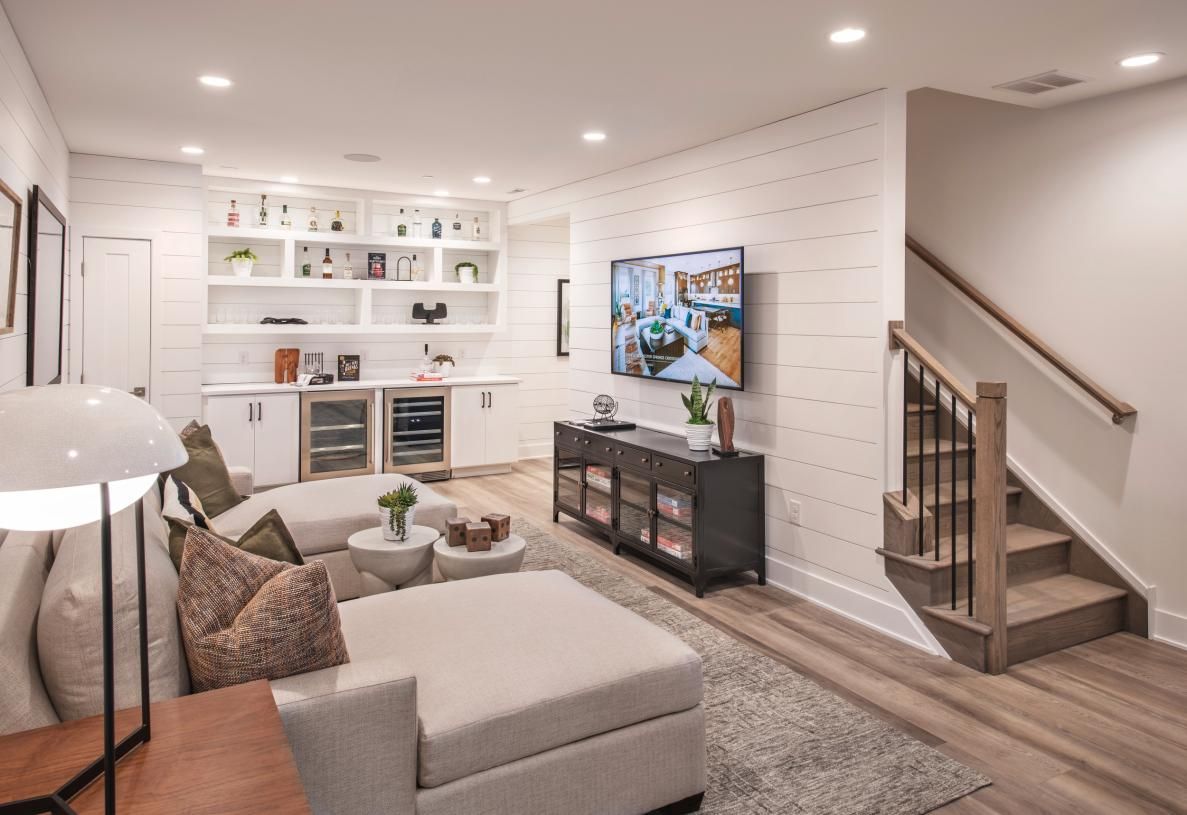 Cozy apartment living room with wall-mounted shelves and built-in storage solutions for extra organization.